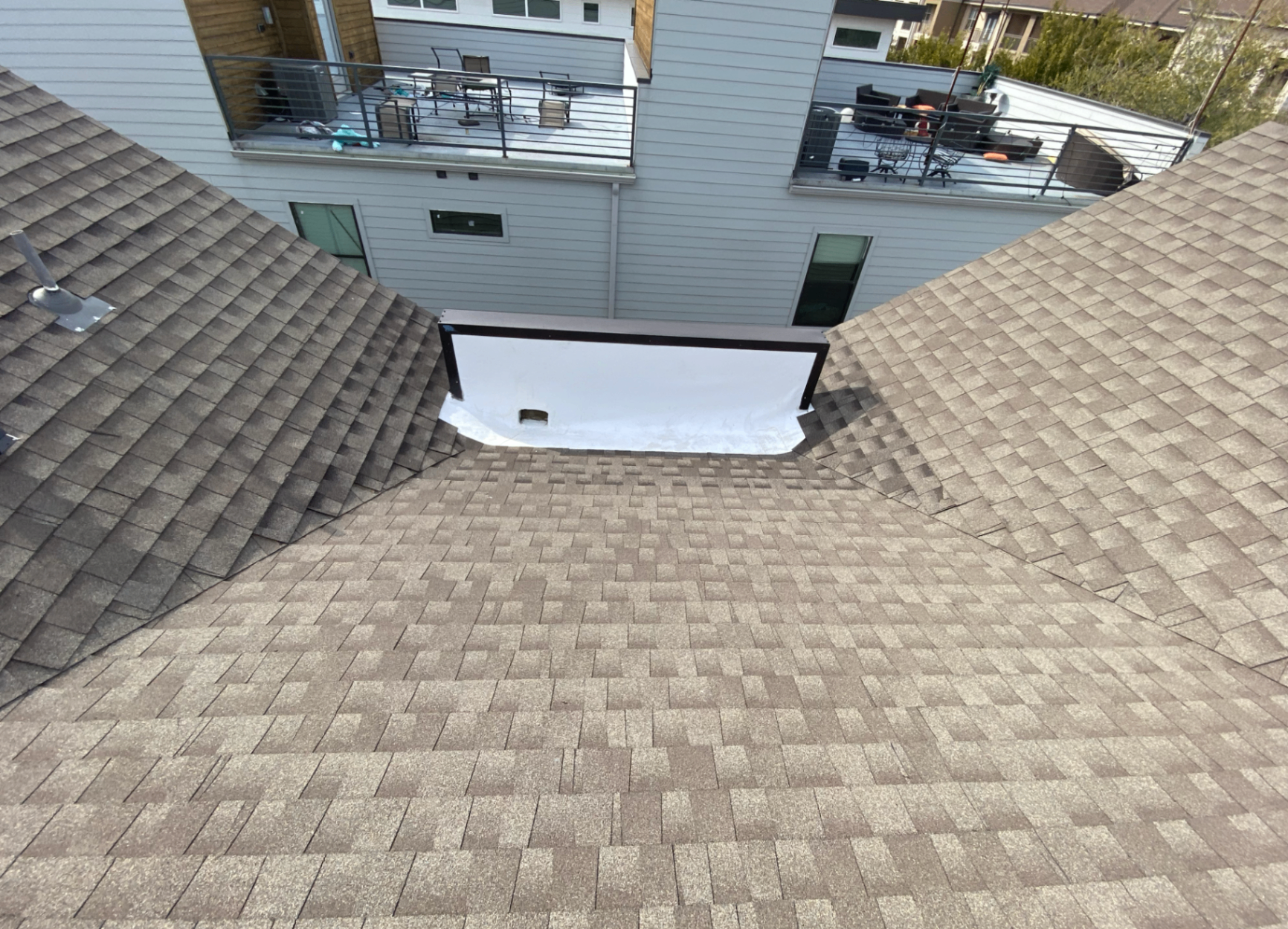 Townhouse roof after professional repair - Medical District Dallas TX expert roofing contractor