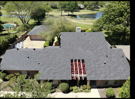 Aerial view of mid-century modern house roof installation in Plano, TX