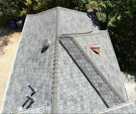 Top-down view of a residential roof replacement in University Park Texas with upgraded architectural shingles